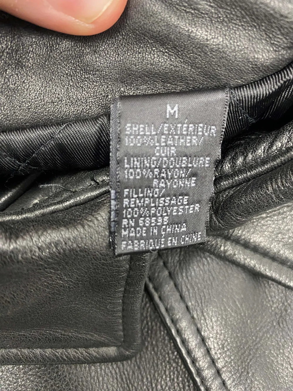 DKNY 90s black leather padded coat — JAMES VELORIA